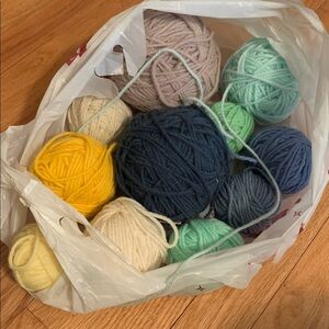 Bag of remnants acrylic yarn skiens blue yellow mint green and neutrals